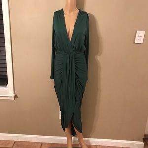 Emerald green low cut dress. Never worn